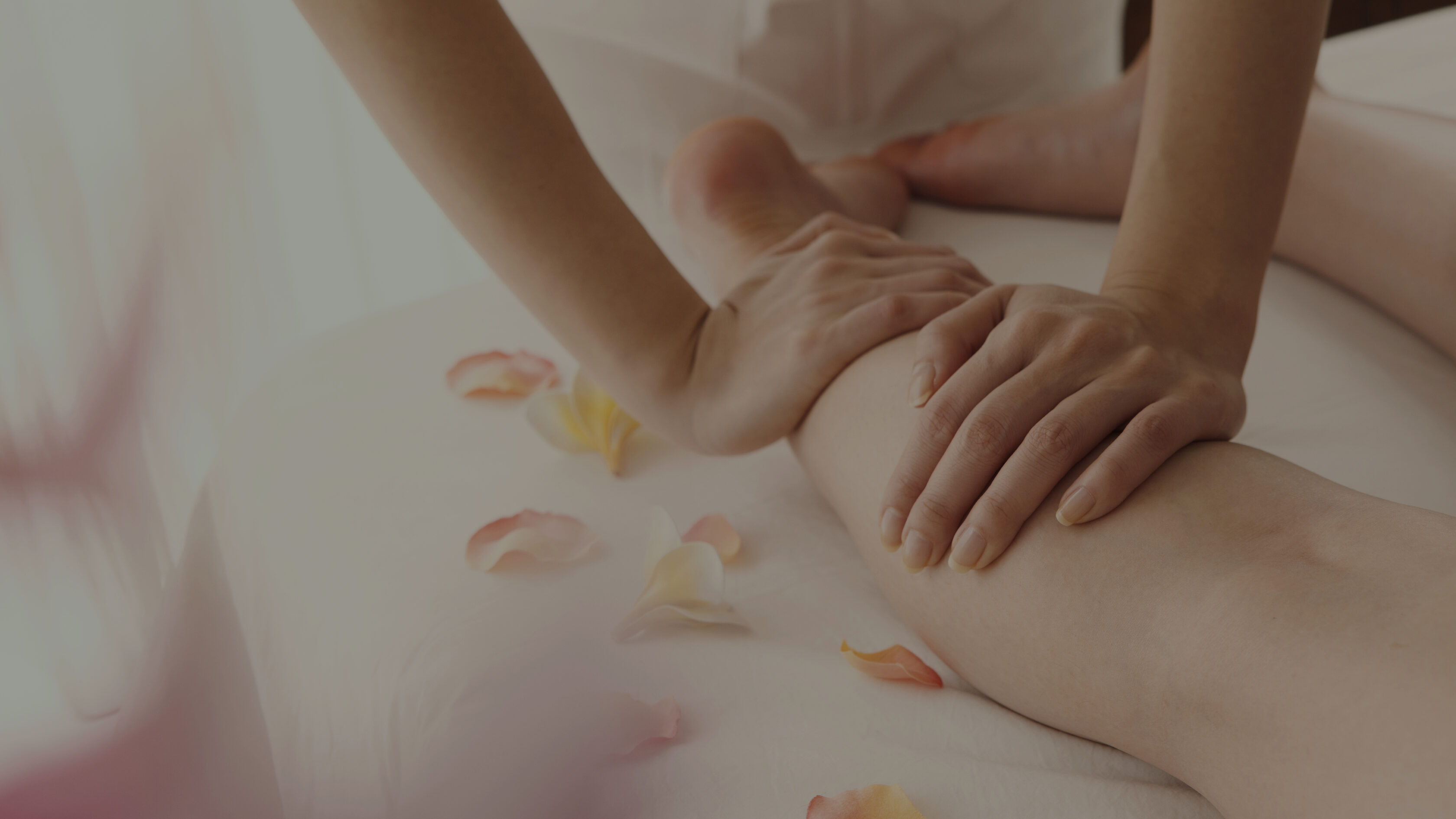 Close-up of woman feet receiving foot massage in spa